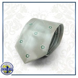 Corbata gris claro con mariquillas de la Macarena