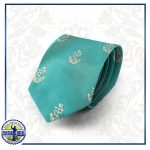 Corbata verde con anclas doradas